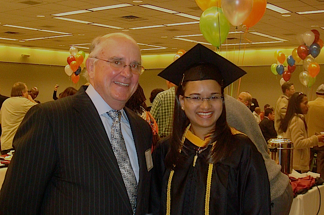 President Lee Gorsuch and Graduate Student Maryam Jaddoo