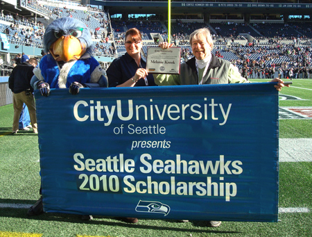 Seahawks Mascot Blitz, Melanie Krook and CityU Provost Steven Olswang. 