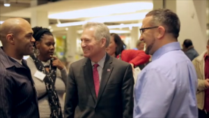 President Frisch with students