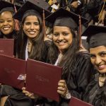 CityU Graduates holding diplomas