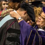 CityU Graduates Receiving diplomas