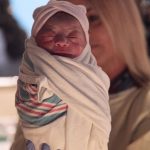 Scott McClave's baby son and wife