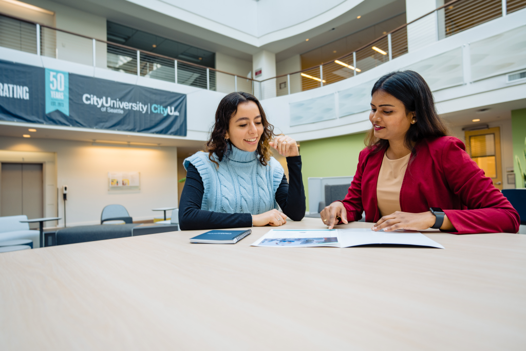 students discussing federal student loans