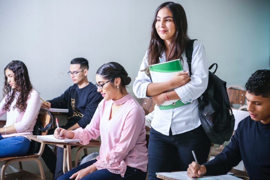 Students in a college course where they can learn how to support dual language learners in the classroom. 